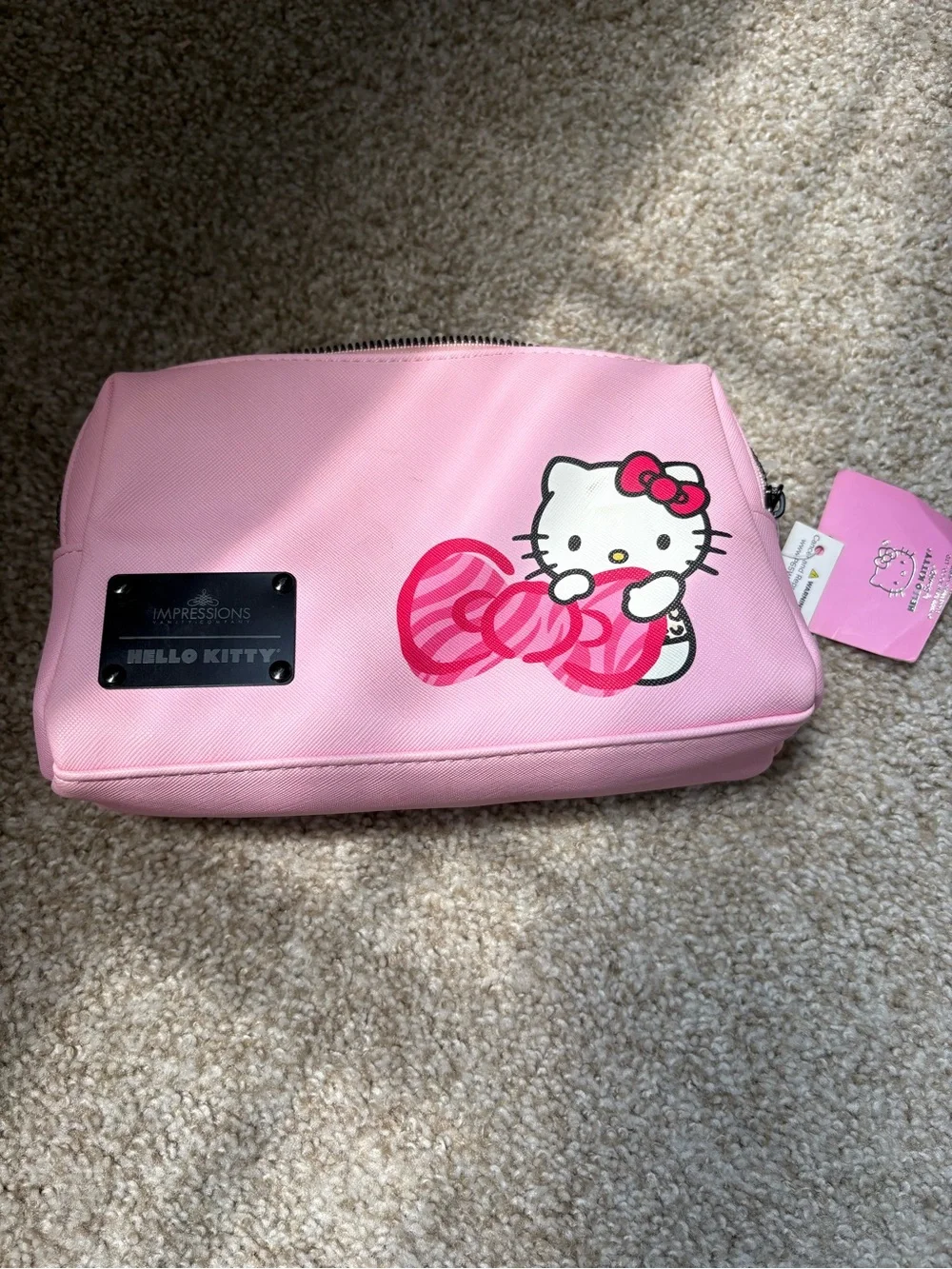 Impressions Hello Kitty Pink Cosmetic Pouch with Striped Bow Graphic
